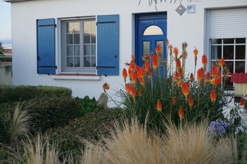 beach house with flowers in garden on the West coast of France