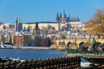 Fototapeta na wymiar architecture, Czech, gothic, history, medieval, Snowy Prague Lesser Town with Prague Castle and Charles Bridge above River Vltava in the sunny Day , Czech republic