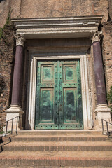 Well preserved bronze door entrance to the pagan Temple of Romulus at the Roman Forum, Rome, Italy