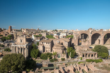 Fototapeta na wymiar Panorama of the Roman Forum with the Temple of Romulus, the Basilica of Maxentius and the Temple of Antoninus and Faustina