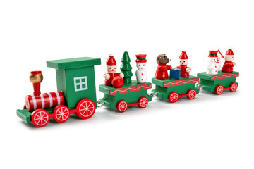 Fototapeta na wymiar Festive Wooden Train with Snowmen and Christmas Trees