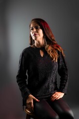 Beautiful and attractive woman sitting confident and confident. 