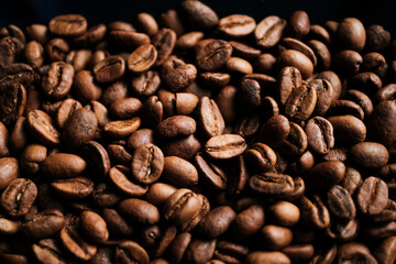 Plane of roasted coffee bean with detail photography. Concept: Macro, coffee break.