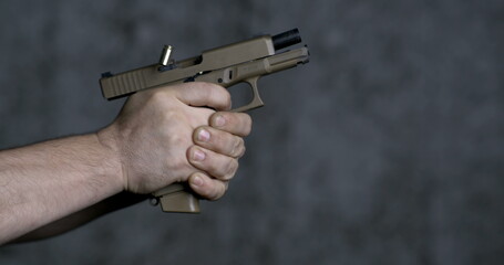 Shooting with a Sig Sauer P320 9mm close-up pistol in super slow-motion 800 fps