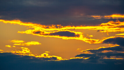 Lush colored clouds in the sky before sunset