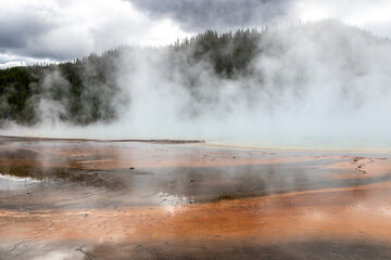 The Grand Prismatic Spring on a cold cloudy winter day in Yellowstone National Park is the largest...