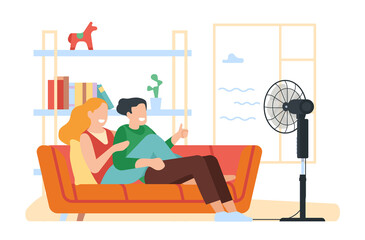 Happy couple guy and girl chill under electric fan at home in summer heat. Man and woman sitting on sofa. Air conditioner. Family relax on couch in front of ventilator. png concept