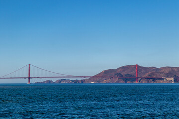 Golden gate bridge from across the bay, Image shows a beautiful blue calm pacific ocean, clear...