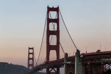golden gate bridge at sunset, image shows the 2737 meter long bridge built in 1937 on a warm...