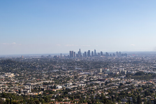 view of los angeles from the griffith observatory, image shows a cityscape view from the observatory on a hot autumns day in california, taken october 2023