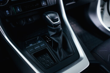 Obraz na płótnie Canvas Modern black car interior, climate control, air ducts, deflectors on the car panel. Details interior. 