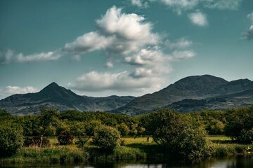 Scenic view of Snowdon mountain against the background of a blue sky. Wales, UK.