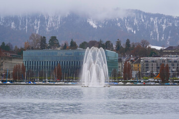 Fountain Aquaretum on Lake Zurich that is connected to a an earthquake station and the water sprays...