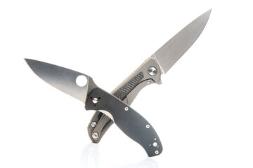 two folding knives on a white background. item for tourism and survival.