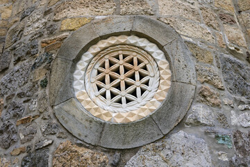 Stone rosette on the Pavlovac monastery in Serbia, detail