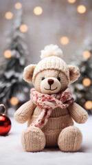 Fototapeta premium Lovely knitted toy bear cute Christmas background, copy free space. Sweet seasonal greeting card.