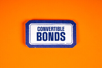 Convertible Bonds. Sticker with text on an orange background