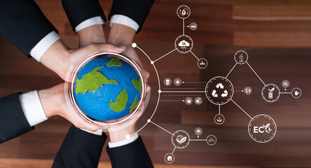Business partnership holding Earth globe together with eco design icon symbolize ESG sustainable...