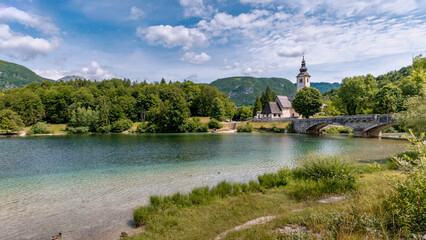 Bridge over the river Bohinjka at the mountain lake Bohinj
