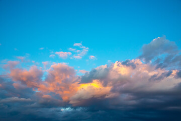 Lush colored clouds in the sky before sunset