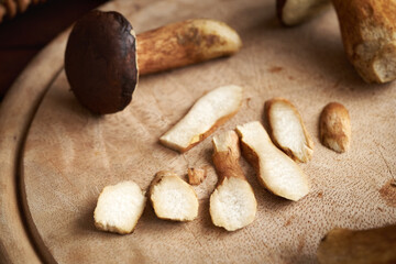 Sliced pine bolete mushrooms on a table