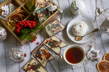 A cup of tea, New Year's toys, a calendar for the New Year 2024. Still life in vintage style.