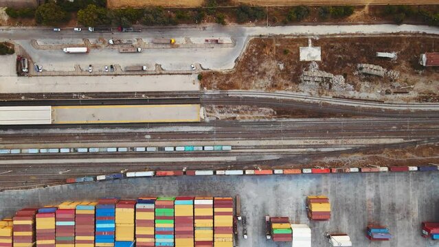 Container terminal intermodal with shipping containers with railway for export import of global international logistic, Aerial view