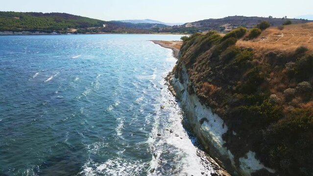 Aerial drone footage of rocky coast of Aegean sea in Turkey