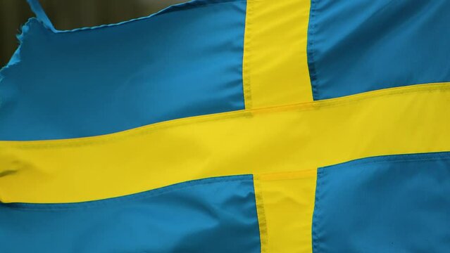 Swedish flag in strong wind