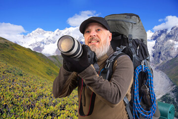 bearded man tourist photographer with a backpack photographs the beauty of nature in the mountains. nature hikes in the mountains