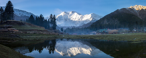 Panorama of Nanga Parbat reflected in a pond at Fairy Meadows. The world's ninth highest mountain...