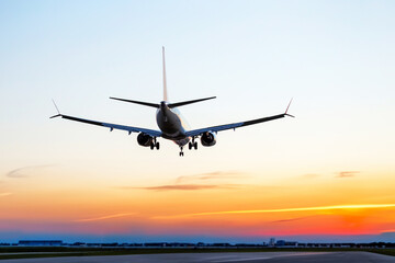 Passenger aircraft landing approach to the airport. Airplane flight in the sky.