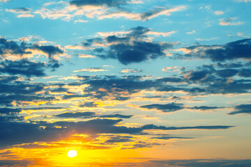 brightly colorful clouds in the evening sky. Lush colored clouds in the sky before sunset. dawn in the clouds