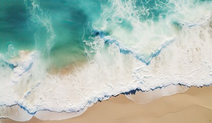 aerial view of an empty beach with waves, with turquoise colors on sunny day
