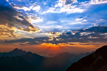 bright sunny dawn in the mountains