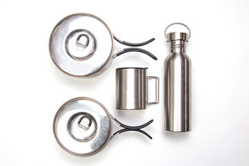 the set of metal utensils for tourism on a white background