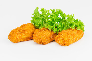 Semi-finished product, fried wings.Breaded Chicken wings with salad on a White Background,food at home.Fast homemade food.Chicken Breaded Raw Meat. Fast cooking.