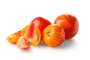 Fototapeta premium Yellow-red striped tomatoes on a white background.