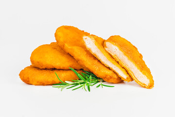 Breaded Chicken Inner Fillet, Chicken Breaded Raw Meat. Fast cooking.Breaded Chicken nuggets Fillet with salad on a White Background,food at home. Fast homemade food.Chicken breaded schnitzels.