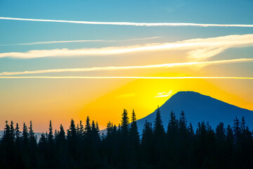 Morning sunrise over the top of a mountain in the Ukrainian Carpathians