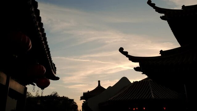 Elements of Chinese traditional buildings on sky background.