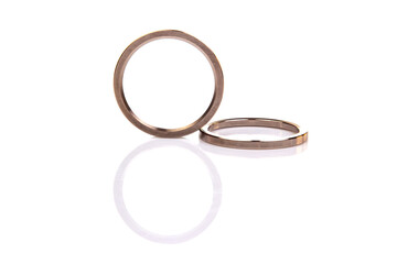 two metal rings on a white background