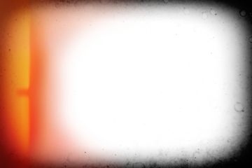 Vintage photo lens vignette template with dust and splatters and red glare on transparent background (png image). Useful for design, vintage film effects, and backgrounds