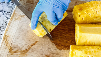 Juicy organic watermelon is being meticulously sliced