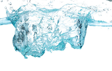 Drinking water pouring into clear glass. Bubbles inside from pouring falling clear water. Drinking...