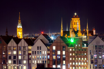 Aerial view of Saint Mary Church and Town Hall at night in Old Town of Gdansk, Poland
