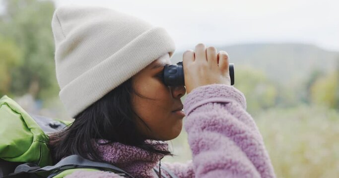 Binoculars, nature or woman hiking on travel journey, jungle adventure or holiday vacation to explore. Sightseeing, hiker on search or traveler trekking in woods looking or bird watching outdoors