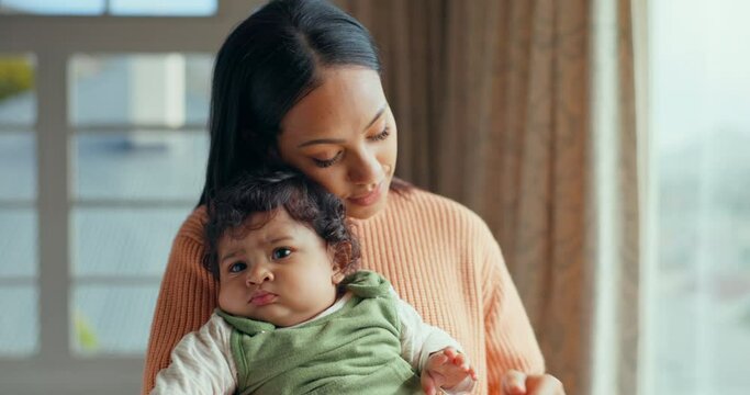 Love, mom with baby in home and bonding with care and hug, holding hands and rocking to calm child. New mother, newborn and safety, support and kindness from woman thinking of future comfort in house