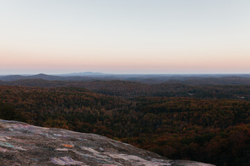 Sunset in the mountains in autumn. Landscape with mountains and picturesque sky at dawn. Horizon. Bird's eye view panorama. Bald Rock, Great Smoky Mountain National Park, South Carolina, USA