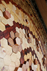 Amazing 3D pattern mosaic hexagon wood wall art floor background with teak wood, walnut, and...
